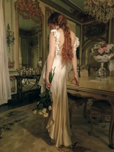 Photo of Lani Gown in White on model, view 1