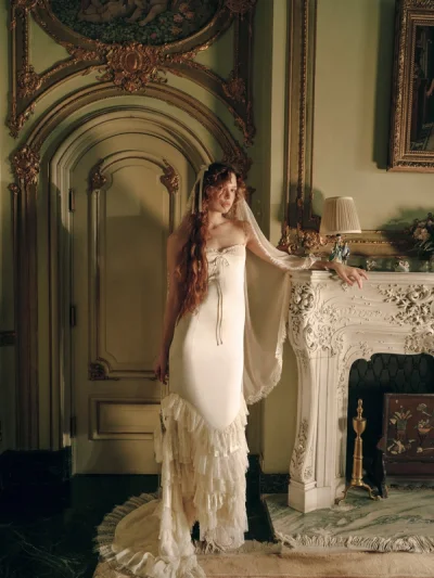 Photo of Vienna Ruffled Gown in Ivory on model, view 1