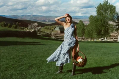 Photo of Bluebird Plaid Midi Dress in Blue on model, view 1