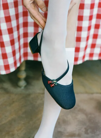 Photo of Charis Block Heel in Blue on model, view 1