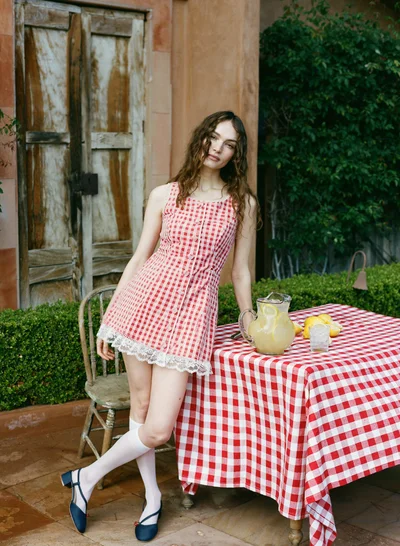 Photo of Venus Mini Dress in Red on model, view 1