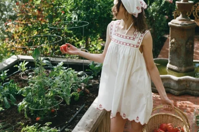 Photo of Emma Mini Dress in White on model, view 1
