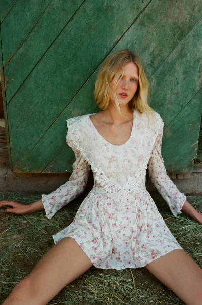 Photo of Country Floral Mini Dress in Ivory on model, view 1